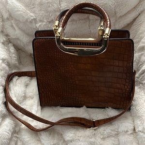 Brown faux crocodile leather purse with handles adjustable strap.